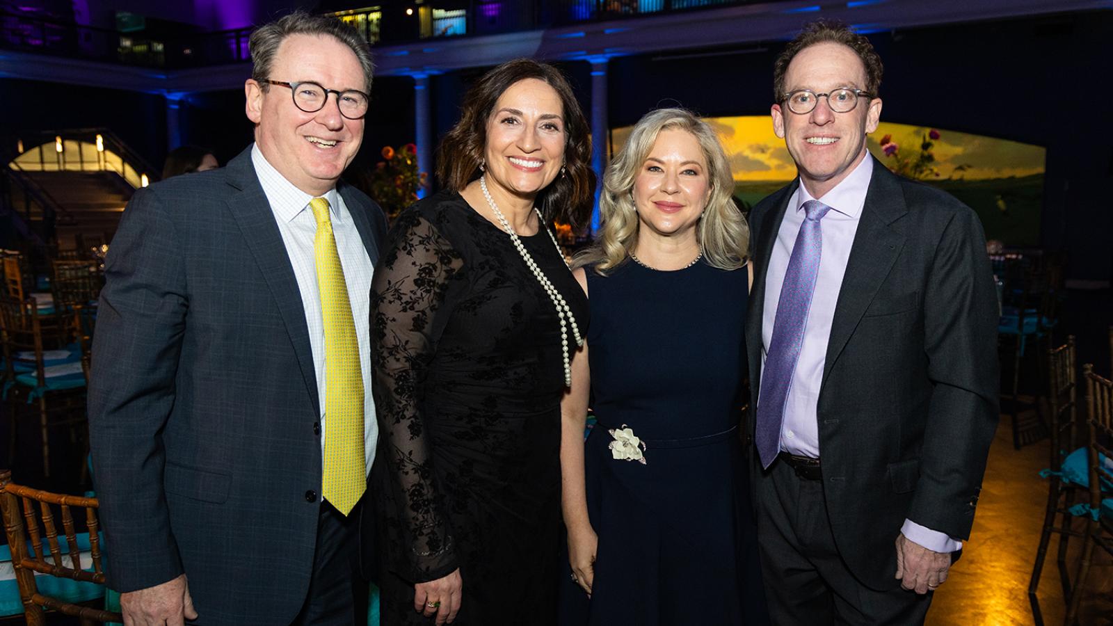 Guests posing at a gala
